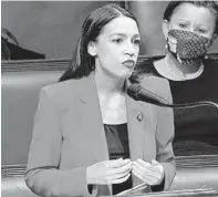  ?? AP ?? Rep. Alexandria Ocasio-Cortez, D-N.Y., speaks on the House floor on July 23 on Capitol Hill in Washington. Ocasio-Cortez's objections to a Republican lawmaker's verbal assault on her expanded as she and other Democrats took to the floor to demand an end to a sexist culture of accepting violence and violent language against women.