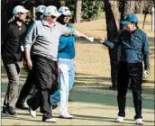  ?? JAPANESE GOVERNMENT 2017 ?? President Donald Trump’s visit to Japan included golf with Japan’s Shinzo Abe, right, who will visit Trump on Tuesday.