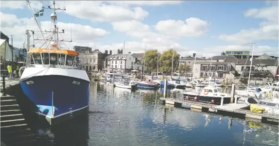  ?? PHOTOS: ANDRE RAMSHAW ?? The view from Cap n' Jaspers in the Barbican quarter of Plymouth. Plans — delayed by COVID-19 — are in the works to mark 400 years since the Mayflower arrived.