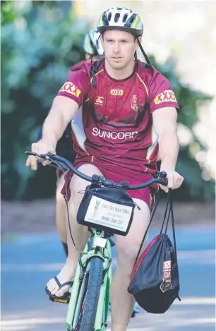  ?? RIDING HIGH: Michael Morgan with the State of Origin side at Sanctuary Cove. ??