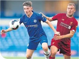  ??  ?? Billy Gilmour against Liverpool’s Herbie Kane in the Premier League 2