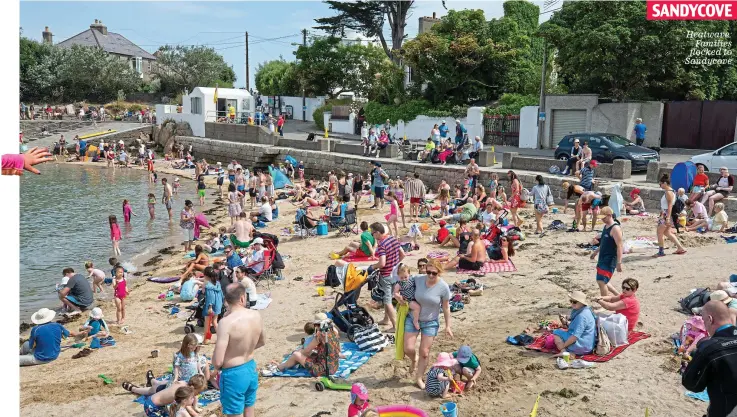 ??  ?? Heatwave: Families flocked to Sandycove