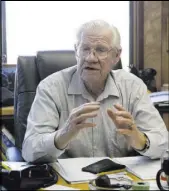  ??  ?? Larry Adams, owner of Pueblo Constructi­on Inc., talks about Arizona’s homebuildi­ng market during an interview at his office in Bullhead City, Ariz.