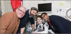  ??  ?? Left, a delighted Connor with Still Game stars Ford Kiernan, Greg Hemphill and Sanjeev Kohli on a hospital viist