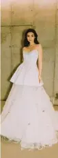  ?? ANDREW KWON ?? A wedding dress with mixed fabrics.