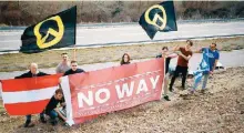  ??  ?? The group posted photos on Twitter where they held Greek and Austrian flags as well as a banner that said, ‘No way - You will not make Europe your home.’