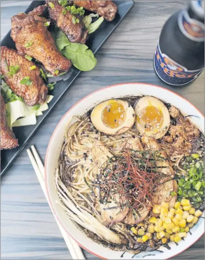  ?? [TIM JOHNSON/ALIVE] ?? From left, the Tso Good wings and the Tiger’s Signature Ramen at Tiger + Lily