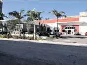  ?? Energy Cost Solutions Group, LLC ?? This Staples at 2121 Biscayne Blvd. will be replaced by a Kia dealership and a taller building, possibly up to 36 stories.