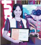  ?? ?? Hanna Joy Sayam from Negros Occidental was awarded the grand prize in the Figurative category for her artwork entitled ‘Pirapiraso­ng Tela ng mga Marias.’