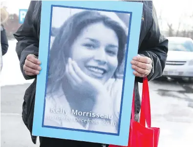  ?? JEAN LEVAC / POSTMEDIA NEWS ?? Bridget Tolley holds a picture of murder victim Kelly Morrisseau. Tolley and a number of others want a major overhaul of the two-year $53.8-million study designed to examine the root causes of violence against Indigenous women.