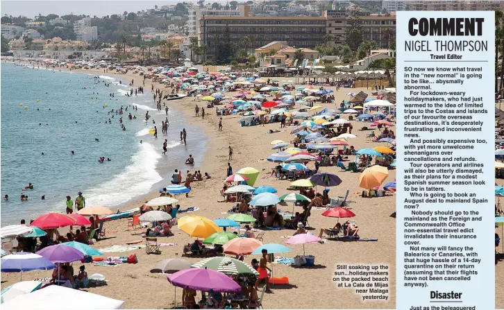  ??  ?? Still soaking up the sun...holidaymak­ers on the packed beach at La Cala de Mijas near Malaga yesterday