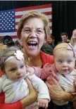  ?? STUART CAHILL PHOTOS/ HERALD STAFF ?? OOH BABY! Sen. Elizabeth Warren reacts as she is handed two babies, Adrienne Drubin, left, and Grace Elliott, while holding a rally at Manchester Community College on Saturday in Manchester, N.H. At left, Warren speaks at the rally.