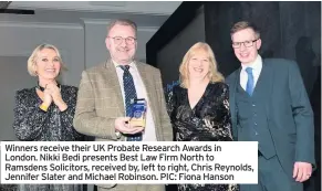  ??  ?? Winners receive their UK Probate Research Awards in London. Nikki Bedi presents Best Law Firm North to Ramsdens Solicitors, received by, left to right, Chris Reynolds, Jennifer Slater and Michael Robinson. PIC: Fiona Hanson