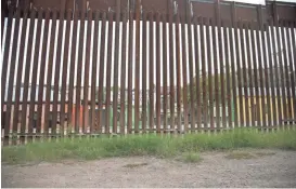  ?? NICK OZA/THE REPUBLIC ?? A portion of the border fence standing today along the U.S.-Mexico border in Nogales, Ariz.