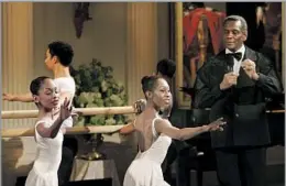  ?? Jim Watson AFP/Getty Images ?? A PASSION FOR DANCE Arthur Mitchell, right, introduces performers from the Dance Theatre of Harlem, which he founded, at the White House in February 2006.