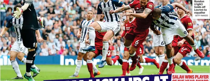  ?? GETTY IMAGES ?? Head boy: Rondon (right) holds off Lovren to equalise
