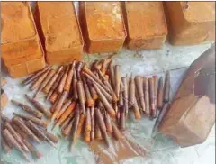  ?? PHOTO SUPPLIED ?? Bullets sit on the ground at a police station in Banteay Meanchey yesterday after they were discovered by a local farmer.