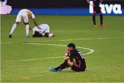  ?? FERNANDO LLANO/ASSOCIATED PRESS ?? Sebastian Soto of the United States reacts at the end of Sunday’s 2-1 loss to Honduras in a CONCACAF Men’s Olympic Qualifying match in Guadalajar­a, Mexico. Honduras qualified for the Tokyo Games, while the U.S. did not.