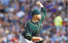  ?? Jim Mone / Associated Press ?? A’s starter Brett Anderson allowed the Twins just four hits in his six innings, but three of them were solo home runs.