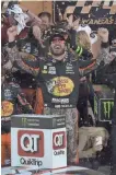  ?? DENNY MEDLEY, USA TODAY SPORTS ?? Martin Truex Jr. celebrates his seventh victory of 2017 and second at Kansas Speedway.