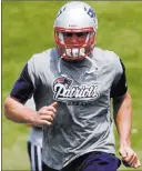  ?? CHARLES KRUPA/ THE ASSOCIATED PRESS ?? Prolific Patriots tight end Rob Gronkowski, shown at a minicamp in Foxborough, Mass., on June 17, played in just seven regular-season games last season.