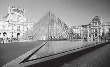  ?? Loic Venance
AFP/Getty Images ?? AN AMERICAN TOURIST
who visits the Louvre Museum in Paris this April can buy 25% more than a year ago with the same dollars.