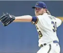  ?? GETTY IMAGES ?? Corbin Burnes had 10 strikeouts in his seven scoreless innings of work Monday night in Milwaukee's 2-0 victory over St. Louis.