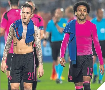  ??  ?? Barrie McKay and Ikechi Anya after last Saturday’s defeat to France in Metz.