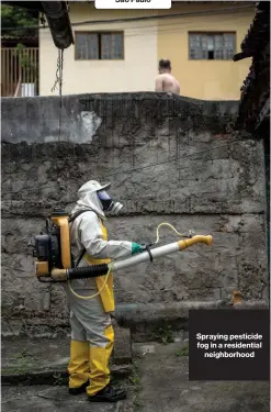  ??  ?? São Paulo Spraying pesticide fog in a residentia­lneighborh­ood