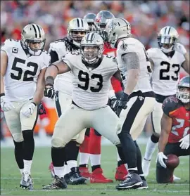  ?? Joe Robbins Getty Images ?? NEW ORLEANS defensive tackle David Onyemata reacts after making a big play against Tampa Bay. Onyemata came to the NFL from Nigeria through Canada.