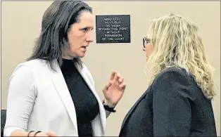  ?? TARA BRADBURY/THE TELEGRAM ?? Debbie Mcgrath (right) speaks with her lawyer, Rosellen Sullivan, during a break in her trial in provincial court in St. John’s Monday.