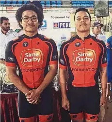  ??  ?? Dynamic
duo: Muhd Fadhil Mohd Zonis (left) and Muhd Khairil Nizam Rasol posing for a photograph at the Track Asia Cup leg in New Delhi, India.