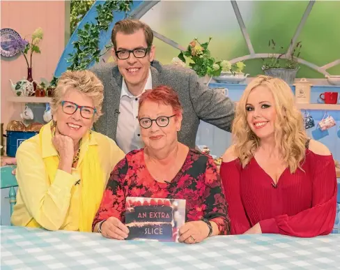  ??  ?? Back in her familiar Extra Slice surroundin­gs, comedian Jo Brand (centre) was sure to rise to the occasion – especially surrounded by new Bake Off judge Prue Leith (left) and stalwart punsters including Richard Osman and Roisin Conaty.