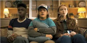  ?? Netflix ?? ■ Shown from left are Caleb McLaughlin as Lucas Sinclair, Gaten Matarazzo as Dustin Henderson and Sadie Sink as Max Mayfield in Season 4 of "Stranger Things."