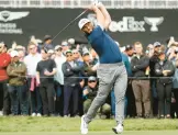  ?? CLIFF HAWKINS/GETTY ?? Jon Rahm plays his shot during the third round of the Genesis Invitation­al on Saturday at Riviera Country Club in Pacific Palisades, California.