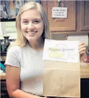  ?? COURTESY PHOTOS ?? Meghan Amundson, 21, shows off her Black Rooster Taqueria Margarita-gram, which her aunt sent for her birthday (proof of ID required). “It was so memorable,” she says.