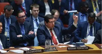  ?? JEWEL SAMAD/AFP/GETTY IMAGES ?? Russia’s deputy UN ambassador, Vladimir Safronkov, asks to speak at a UN Security Council meeting on Syria.