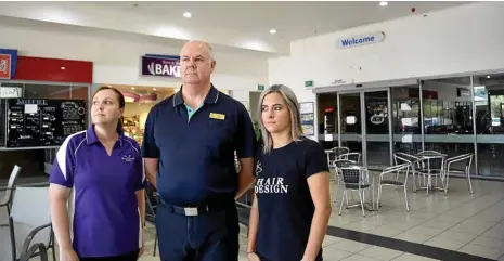  ?? PHOTO: BEV LACEY ?? GHOST TOWN: Worried about the lack of business in the Bridge Street Plaza complex are (from left) Born and Bread Bakery owner Alison Reeves, Bridge Street Plaza Pharmacy owner Peter Degnian and RH Design Kristie Sharpley.