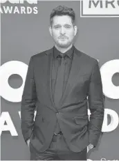  ?? JORDAN STRAUSS/INVISION ?? Singer Michael Buble, seen May 15, will start the U.S. leg of his “Higher” tour Monday in Georgia.