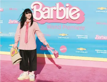  ?? MICHAEL TRAN/GETTY-AFP ?? Billie Eilish, who wrote a song for the film, arrives July 9 for the “Barbie” world premiere in Los Angeles.