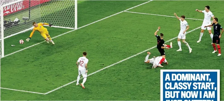  ?? REUTERS ?? Just out of reach: Jordan Pickford dives to his right but Ivan Perisic’s clever, crucial touch is past him, it’s 1-1
