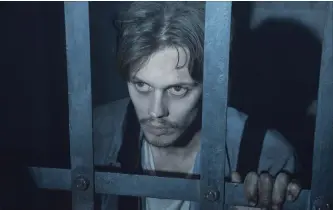  ?? PATRICK HARBRON THE ASSOCIATED PRESS ?? Bill Skarsgard as “The Kid,” who is found in a cage in a long-unused section of Shawshank in “Castle Rock.”