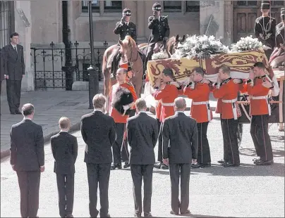  ?? AP FILE PHOTO ?? In this Sept. 6, 1997 photo, Britain’s Prince Charles, Prince Harry, Earl Charles Spencer, Prince William and Prince Philip (from left) stand as the coffin bearing the body of Princess Diana is taken into Westminste­r Abbey in London. It has been 20...