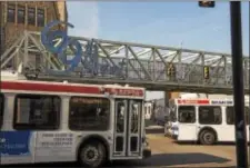  ?? RICK KAUFFMAN – DIGITAL FIRST MEDIA ?? A bus rolls in the vicinity of 69th Street Terminal in Upper Darby. Starting July 1, it will cost more to ride all types of SEPTA transit.