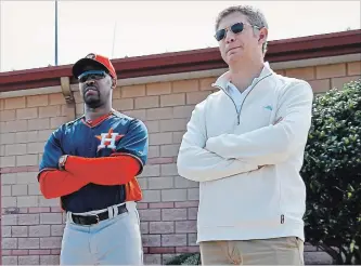  ?? ALEX BRANDON
THE ASSOCIATED PRESS FILE PHOTO ?? Mike Elias, right, shown in 2014 with then-Houston Astros manager Bo Porter, is joining the Baltimore Orioles as general manager. Elias had a major hand in the Astros’ rise to 2017 World Series champions.