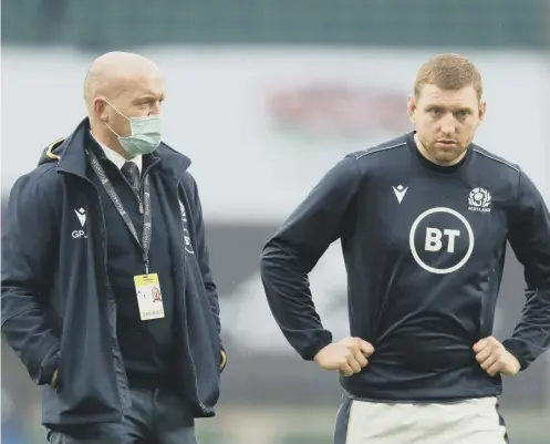  ??  ?? 0 Scotland coach Gregor Townsend, pictured with Finn Russell, said he was disappoint­ed not to be able to play France on Sunday