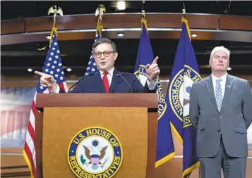  ?? J. SCOTT APPLEWHITE AP ?? House Speaker Mike Johnson, R-La., joined at right by Majority Whip Tom Emmer, R-Minn., discusses a continuing resolution to keep the federal government funded at its current levels.