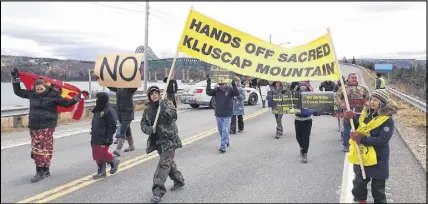  ?? THE CANADIAN Press/ecology Action Centre, Raymond Plourde ?? Protesters gather at Cape Breton’s Seal Island Bridge to object to mining projects on Kellys Mountain, in New Harris, N.S., on Saturday.