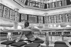  ??  ?? As the year is almost coming to a close, there is a general upbeat over Malaysia's prospects for 2019 but there is hardly any noticeable change in the flow of foreign funds into the local equity. — AFP photo