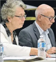  ?? RYAN ROSS/THE GUARDIAN ?? Public Schools Branch board of directors chairwoman Susan Willis and board member Harvey MacEwen prepare for Tuesday’s meeting at Stratford Elementary School.